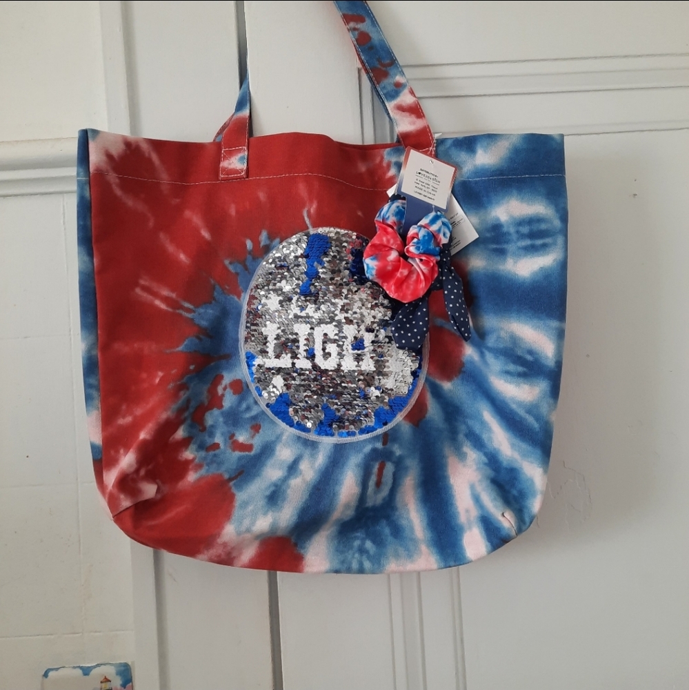 Aeropostale P.S. tie dye bag with attached scruchys.